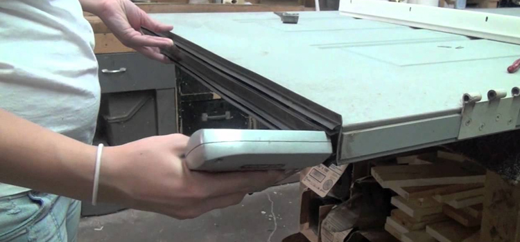 damaged steel door repair Bostonia